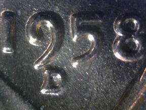 1958-D-RPM-High-Mint-Mark-And-A-Small-Cud